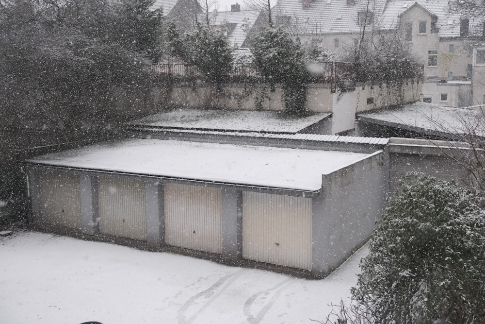 a building with a roof covered in snow