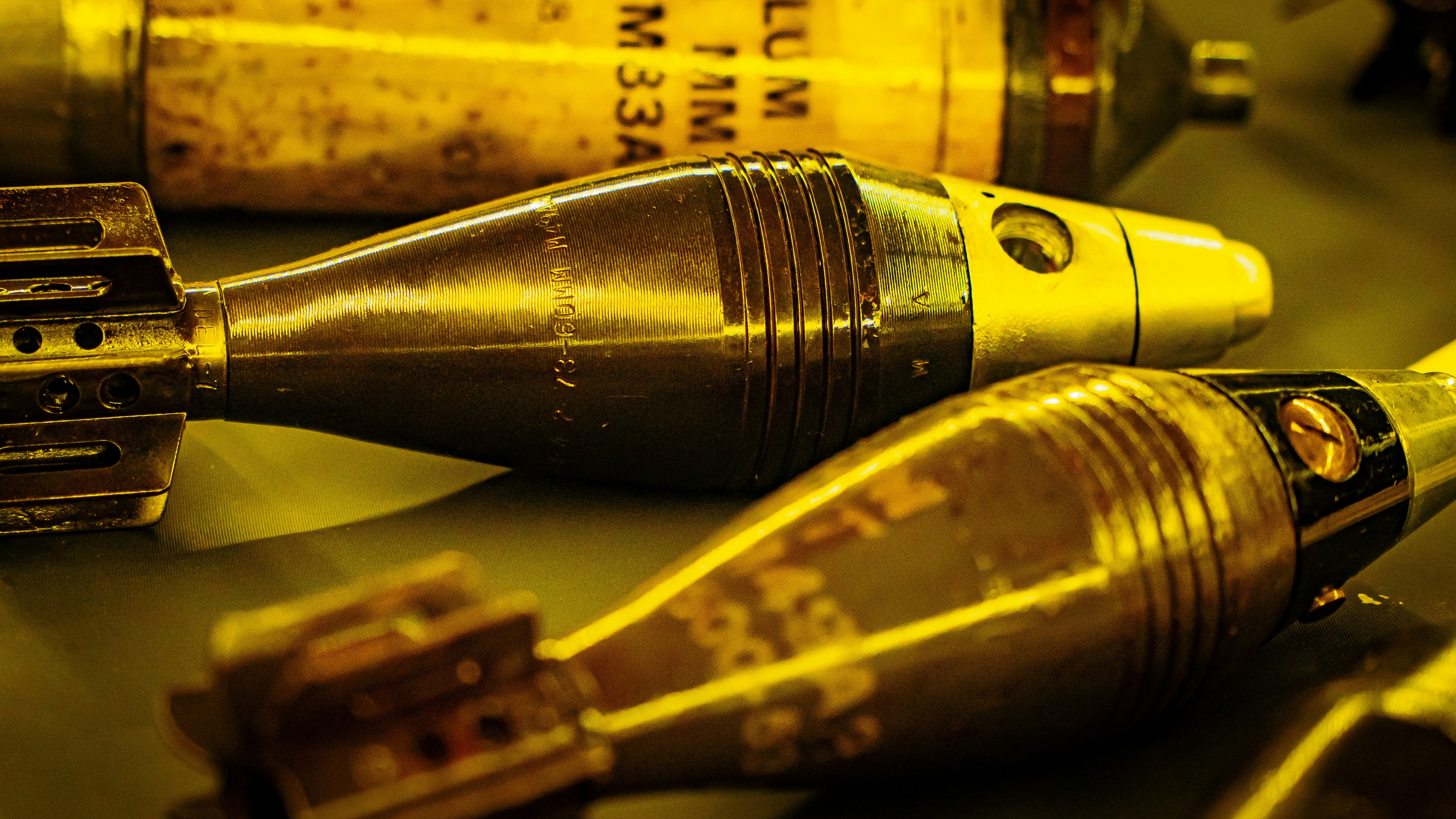 a close up of a bunch of pens on a table