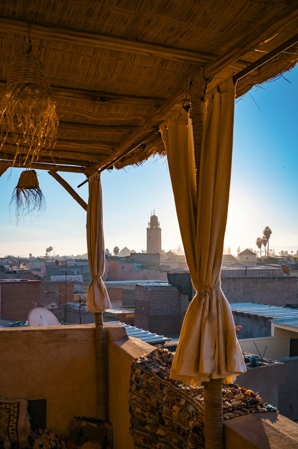 a view of a city from a covered area