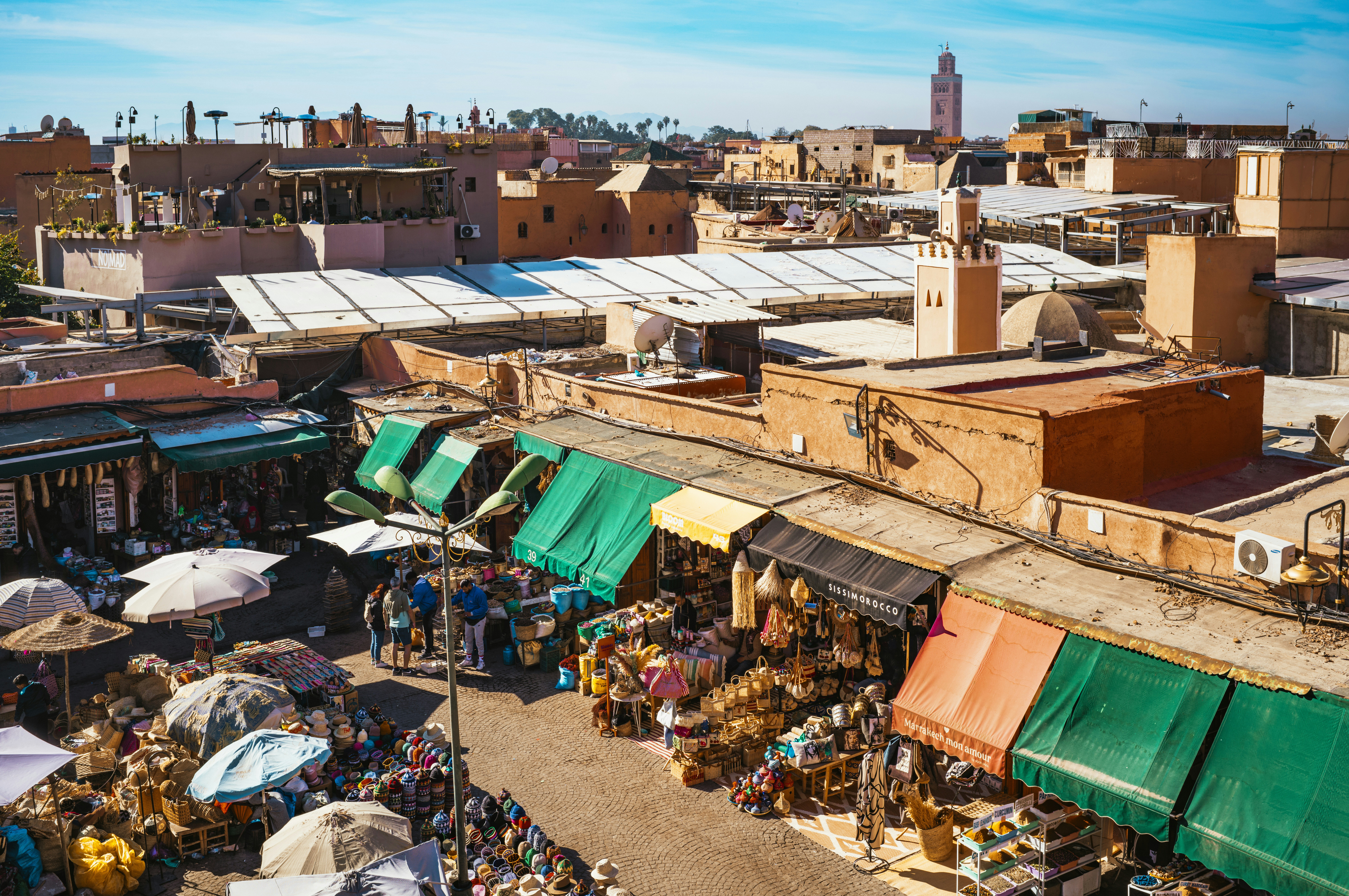 A view of a street market in a small town photo – Free City Image on ...