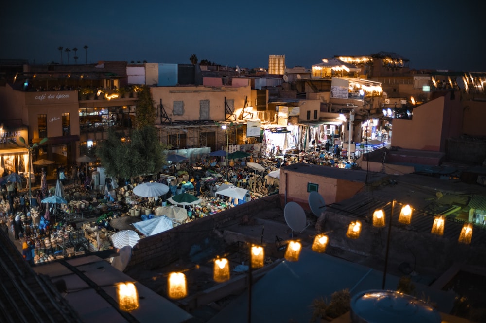 a view of a city at night from a rooftop