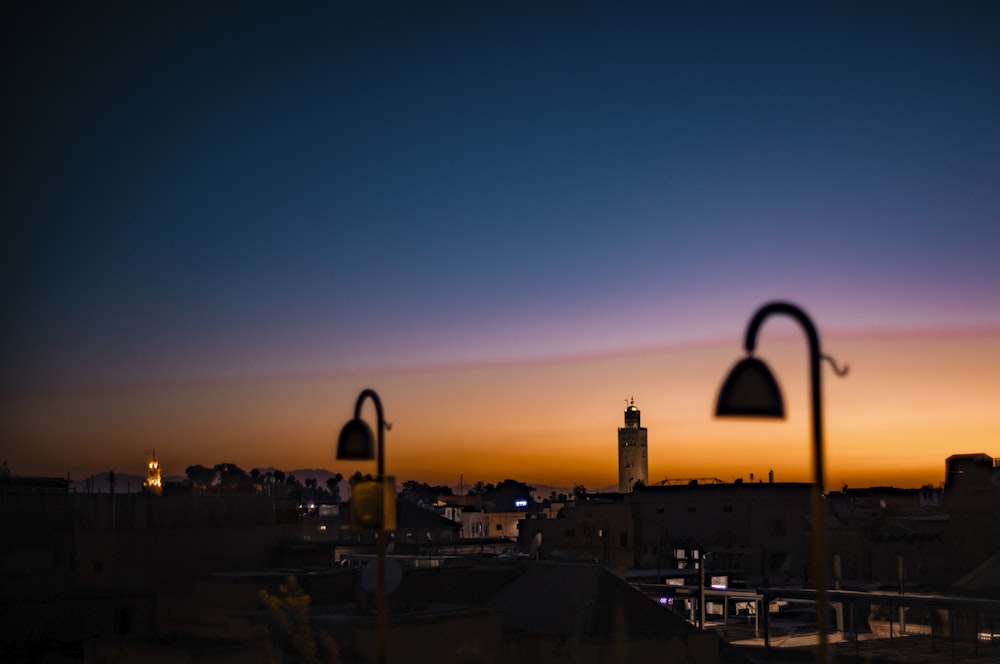 a view of a city at night from a rooftop