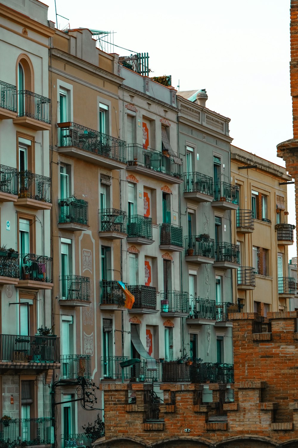 a row of buildings with balconies and balconies on them