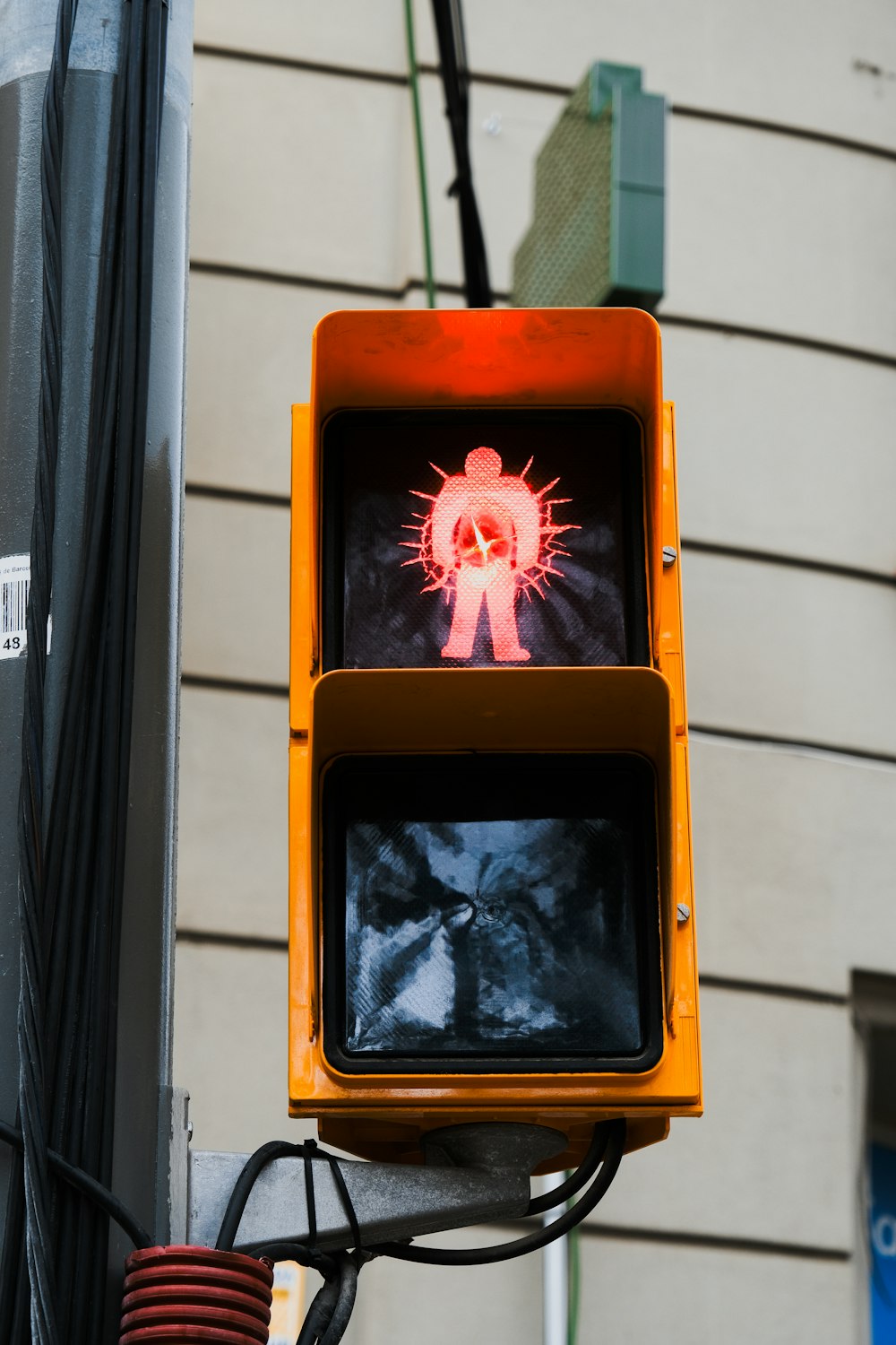 a traffic light with a picture of a person on it