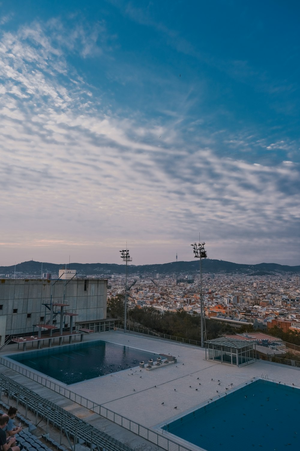 a large swimming pool in the middle of a city