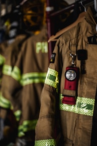 a fireman's uniform hanging on a rack
