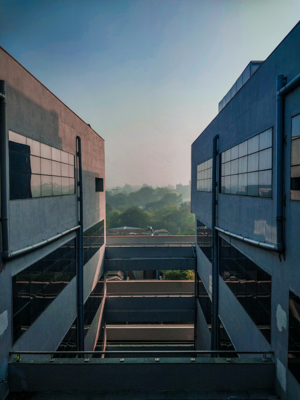 a view of a parking lot from the top of a building