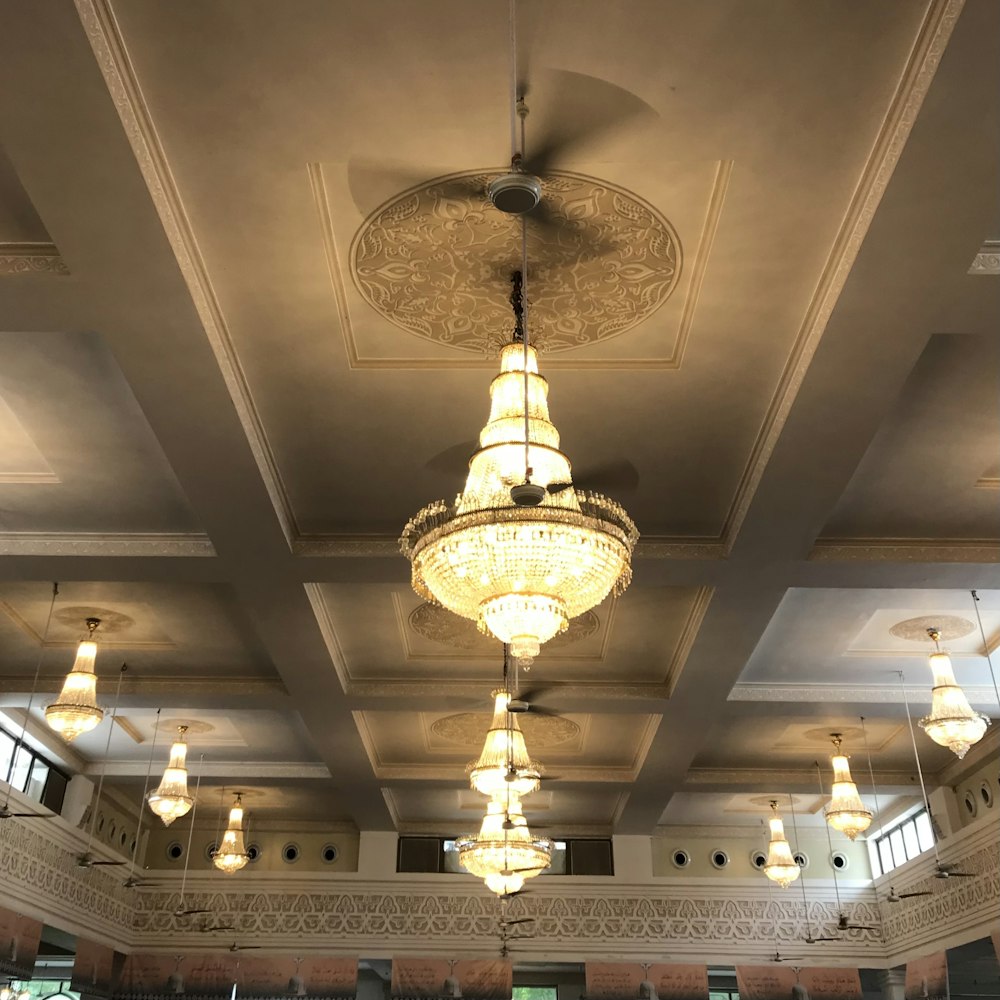 a chandelier hanging from the ceiling of a building