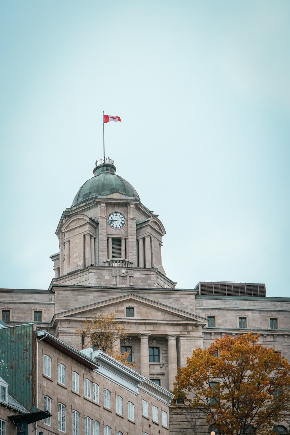 a large building with a clock on the top of it