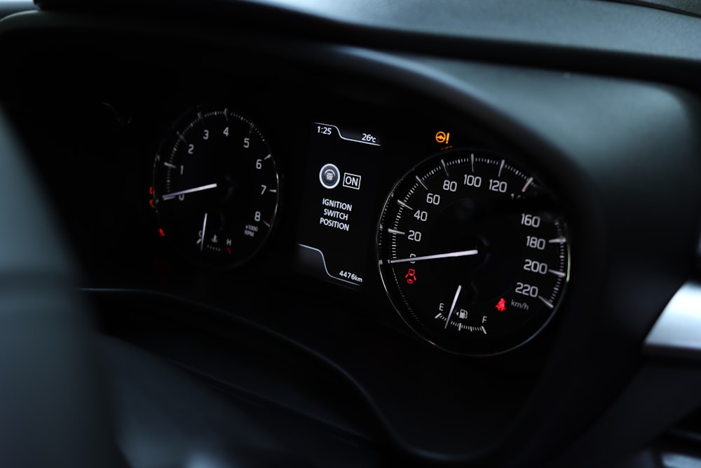 a close up of a speedometer in a vehicle