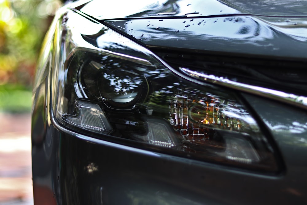 a close up of a car's headlight