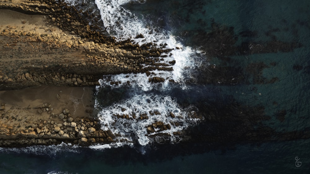 a bird's eye view of a rocky coastline