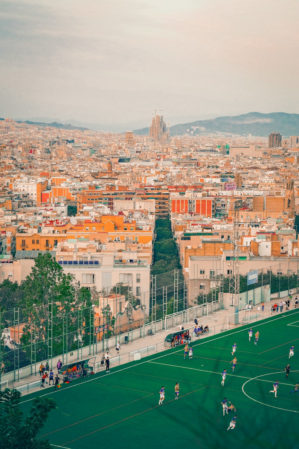 a group of people playing soccer on a field