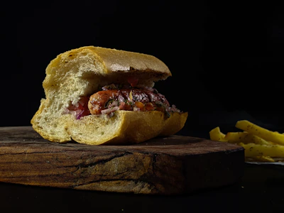 a close up of a sandwich on a cutting board