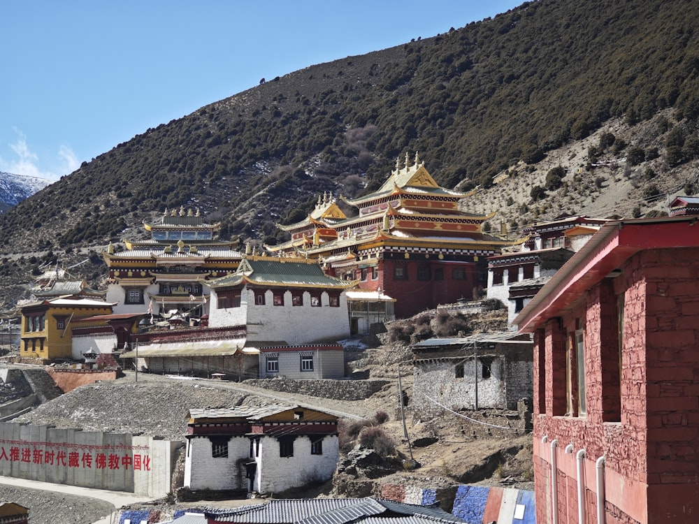 a group of buildings sitting on top of a mountain