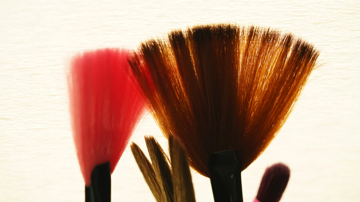 Three tint brushes standing in a cup at Kit's colour bar