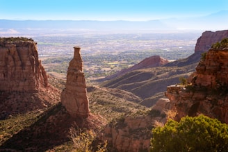 a view of a valley and mountains from a high point of view