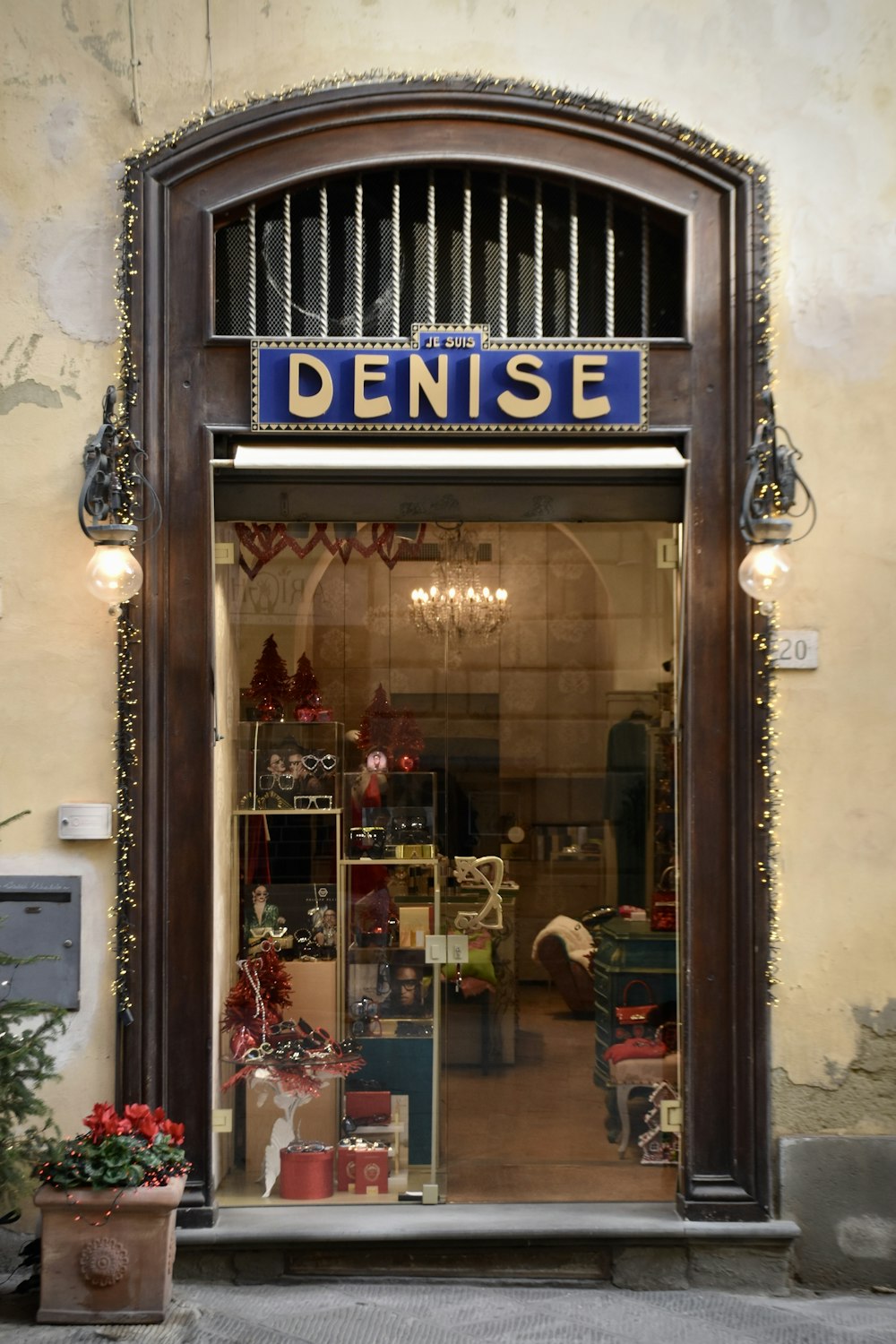 a store front with a bunch of items in the window