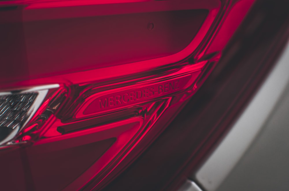 a close up of a red car door