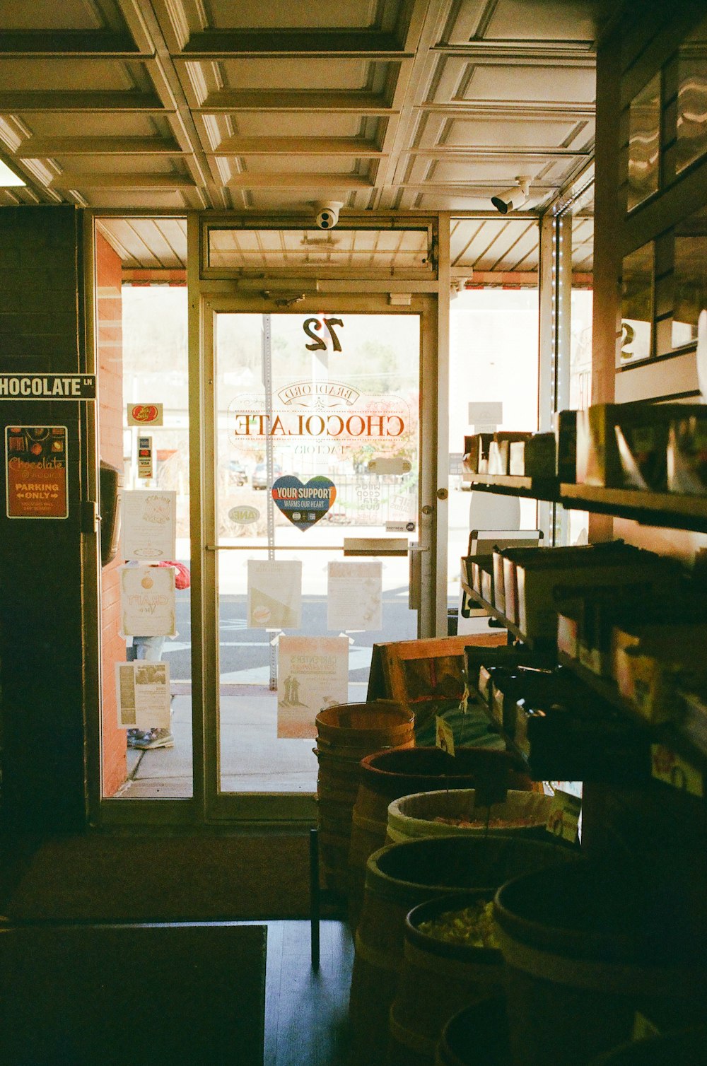 a store with a door that has a sign on it