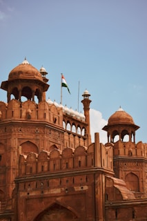 a large building with a flag on top of it