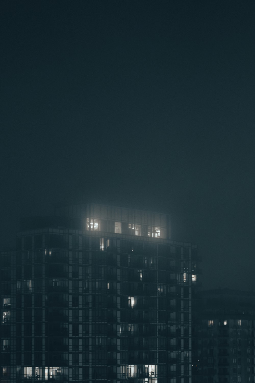 an airplane flying over a city at night