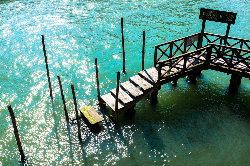 a wooden bridge over a body of water