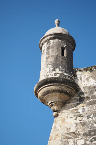 a tall tower with a sky in the background
