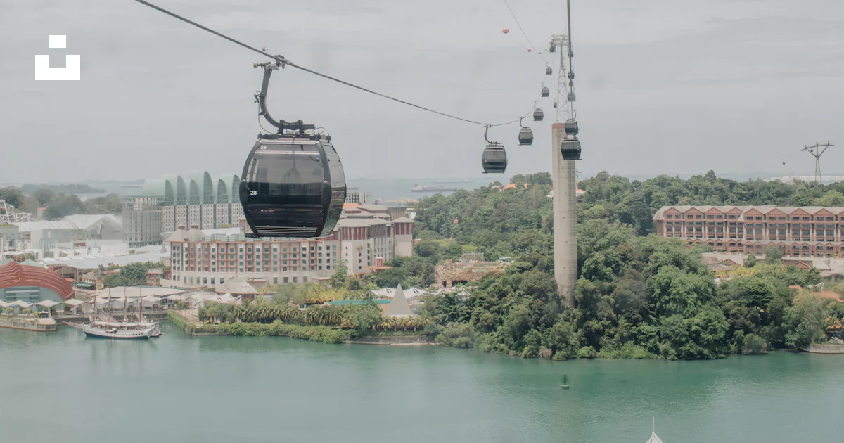 Cable Car Floating A cable car going over a body of water photo – Free Singapore Image on ...