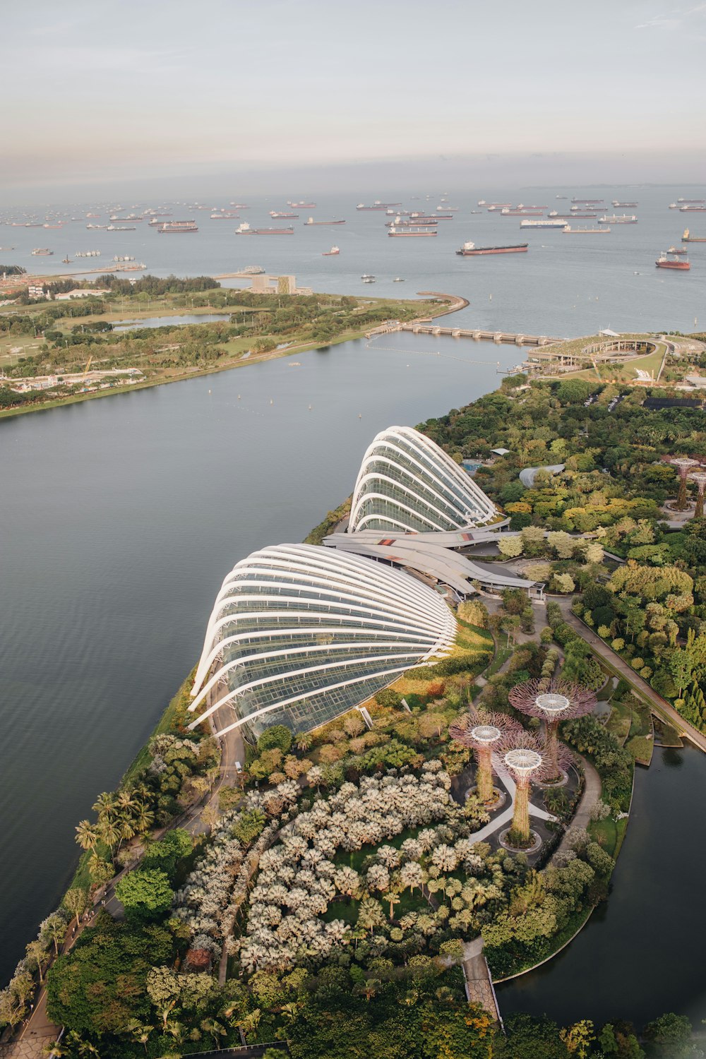 a bird's eye view of a garden and a river