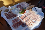 a table topped with lots of different types of food