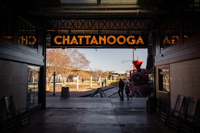 a train station with a train on the tracks