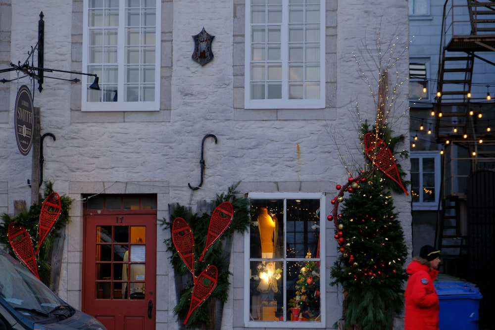 a building with christmas decorations on the outside of it