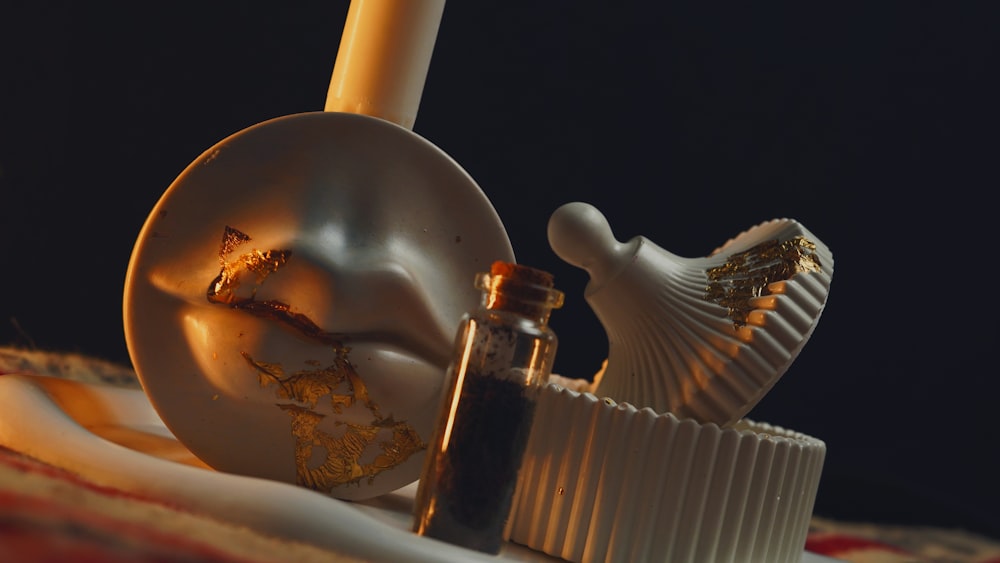 a close up of a bottle of perfume on a table