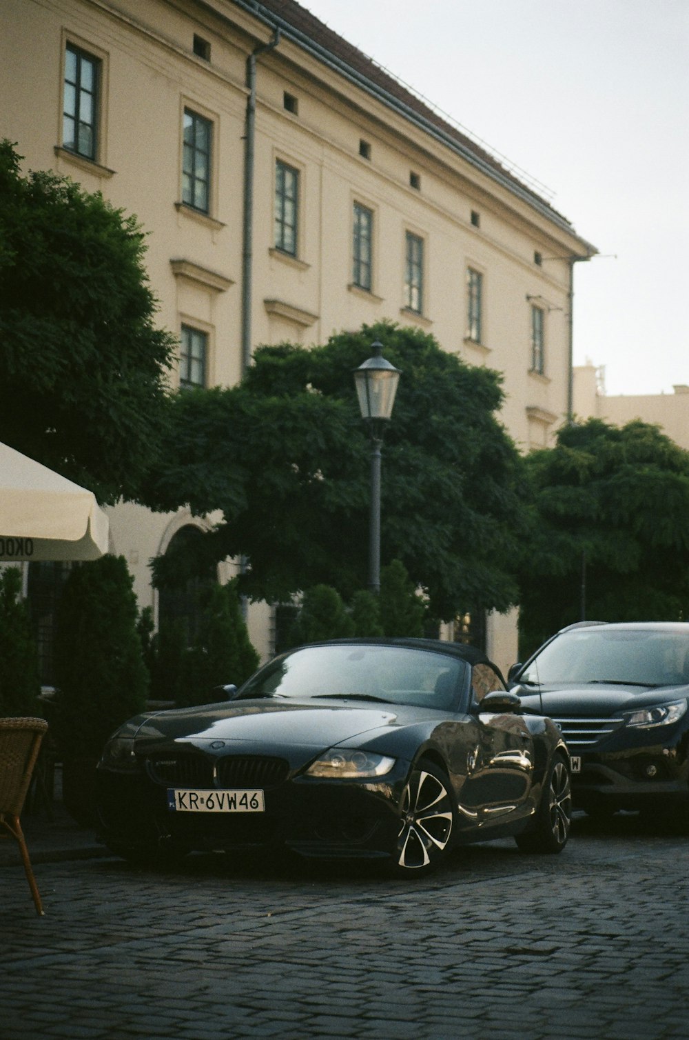 a couple of cars parked next to each other