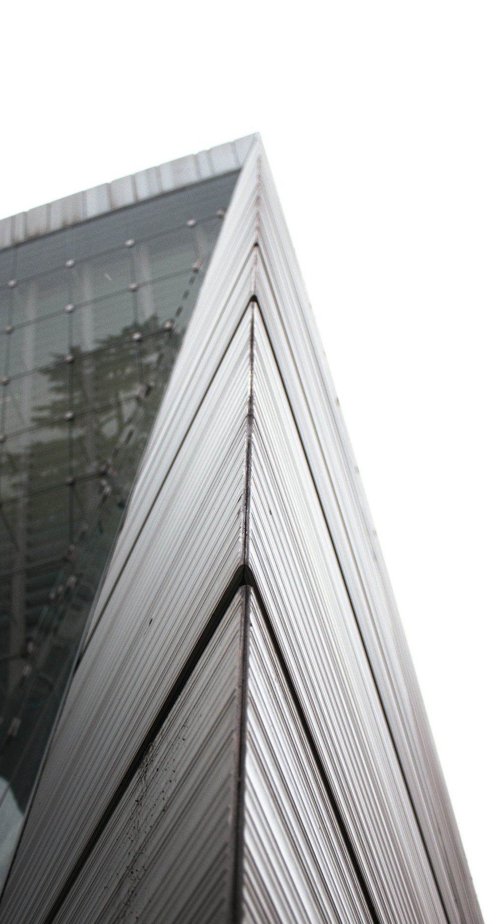 a close up of a tall building with a sky background