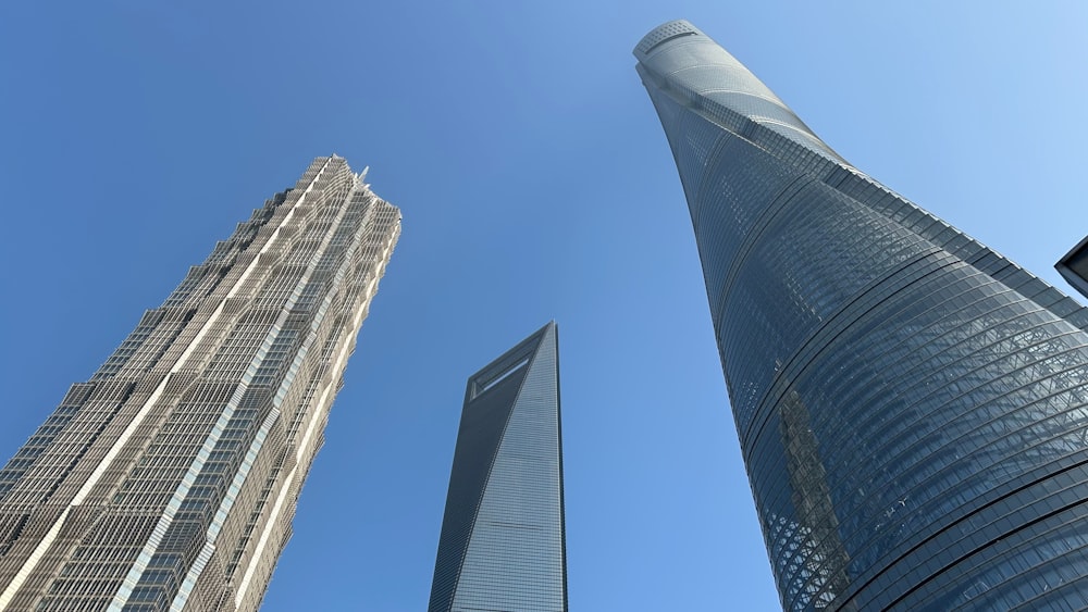 a group of tall buildings standing next to each other