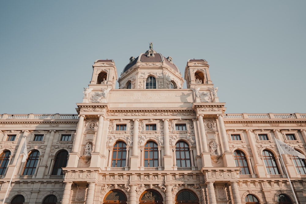 a large building with a clock on the top of it