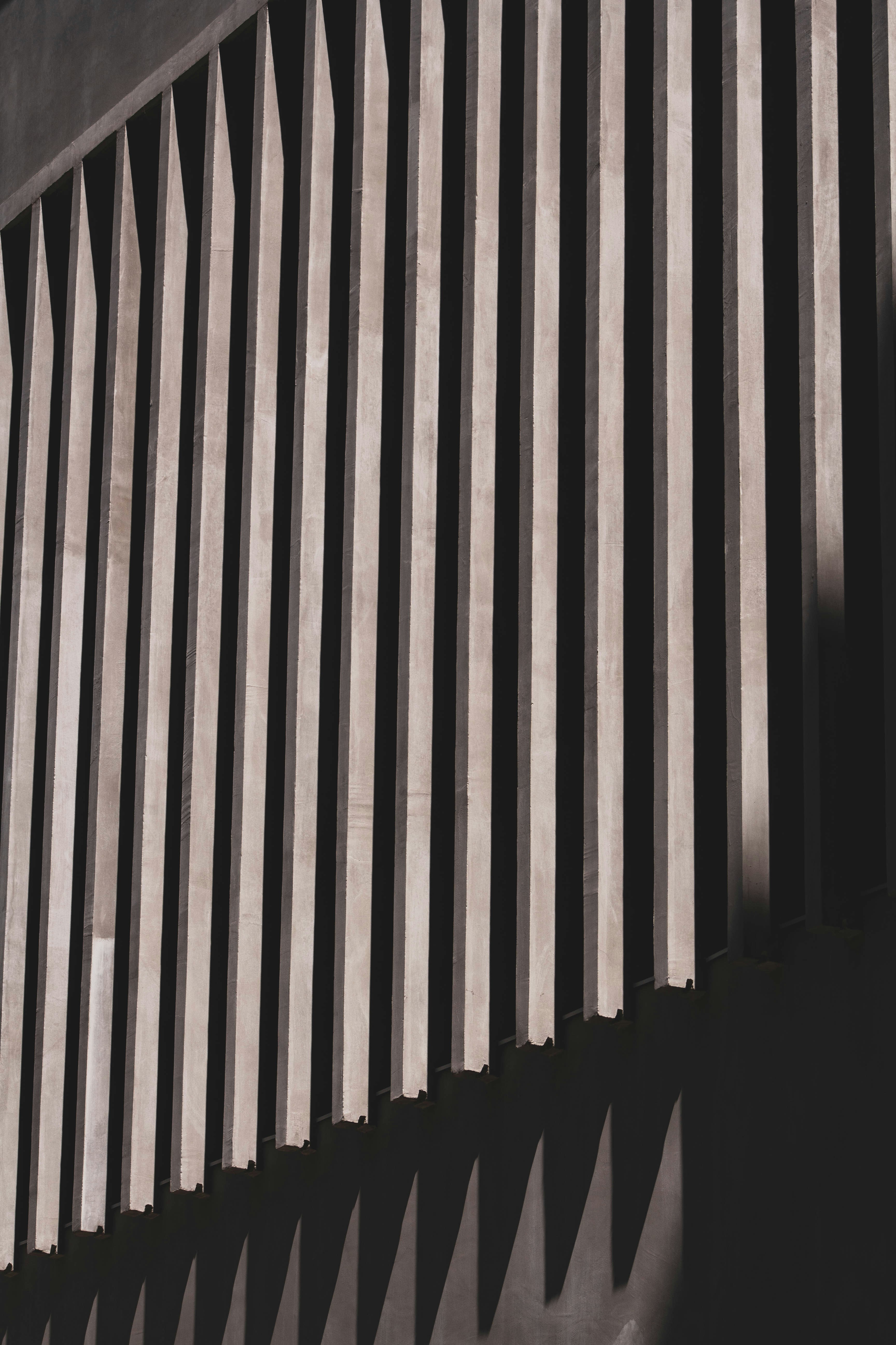 a black and white photo of the side of a building