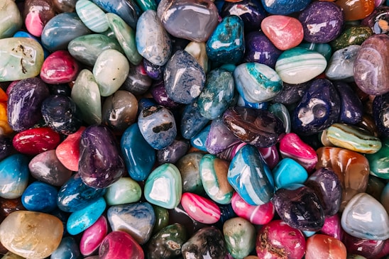a pile of colorful rocks sitting next to each other