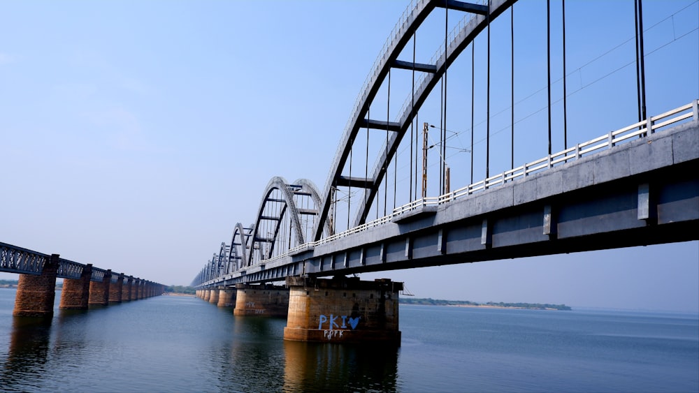 a large bridge spanning over a large body of water