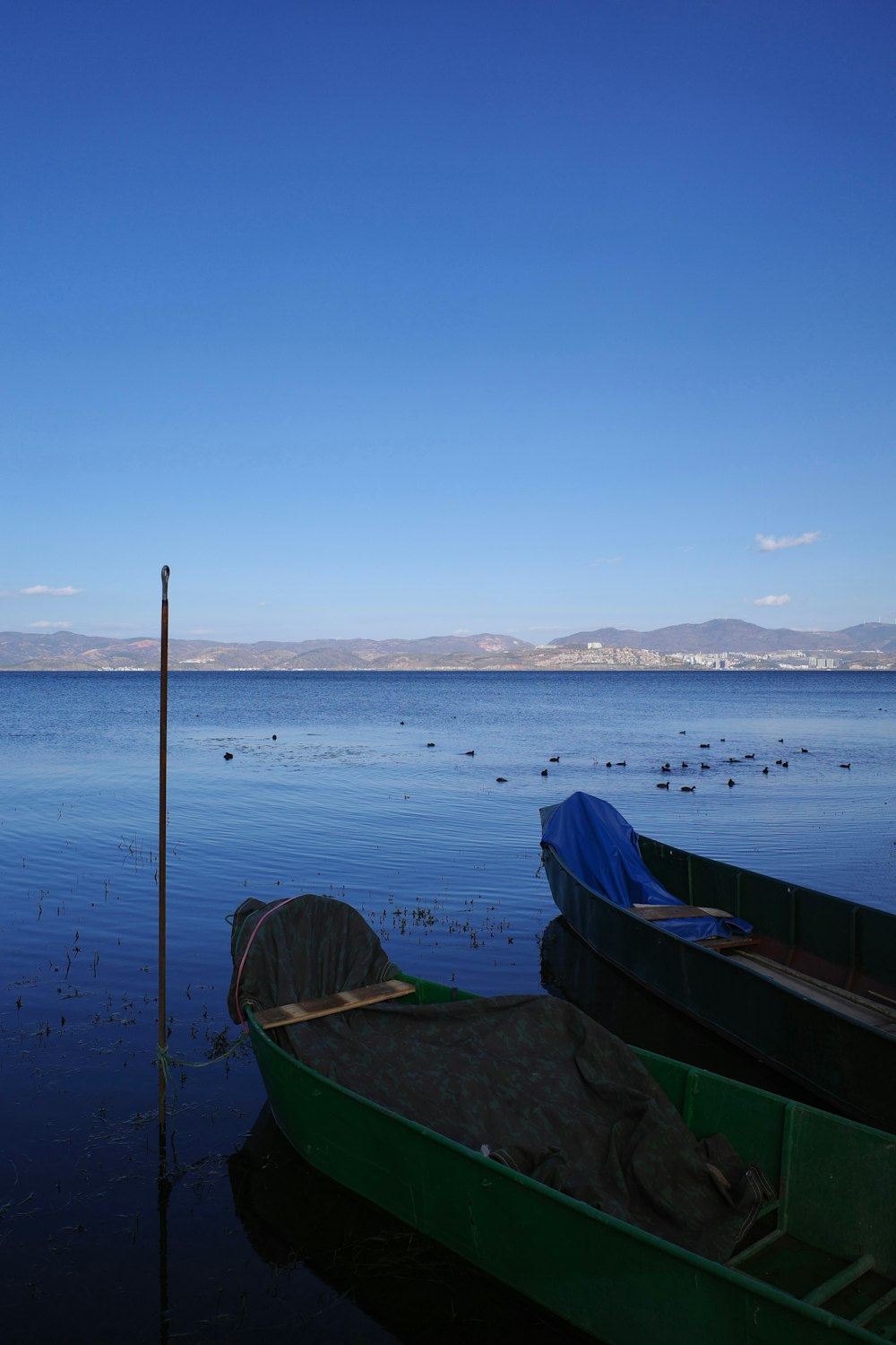 a couple of boats that are sitting in the water