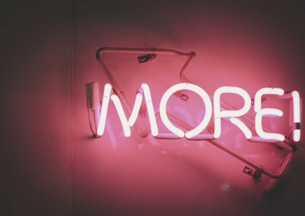 a neon sign that says more on it