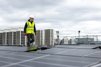 a man standing on top of a roof