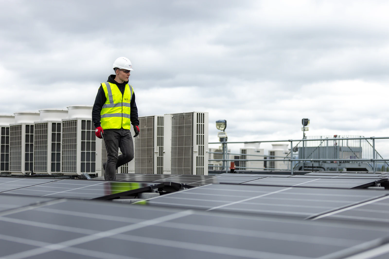 HVAC technician on a rooftop unit