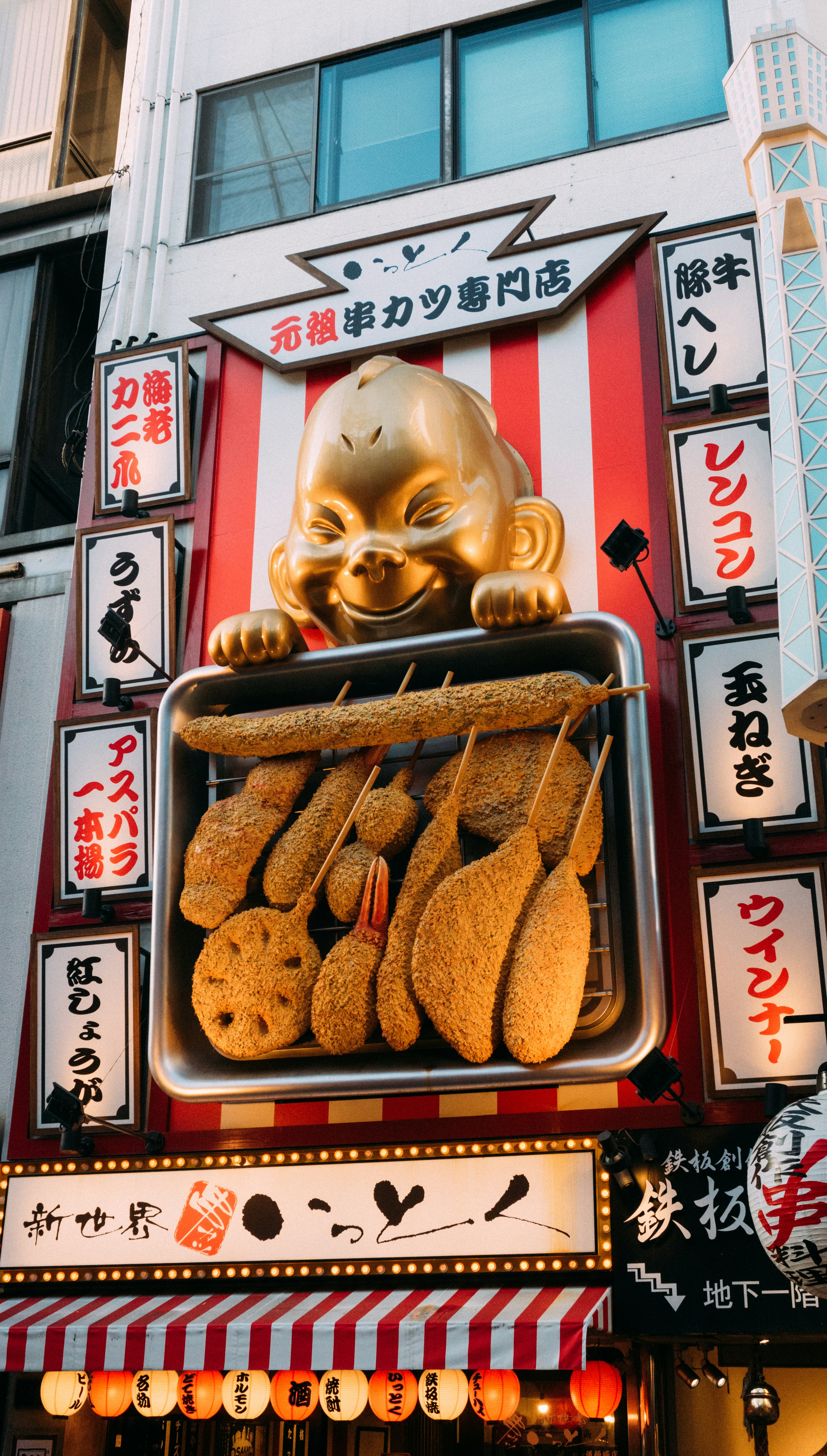 a street sign with a bunch of food on it