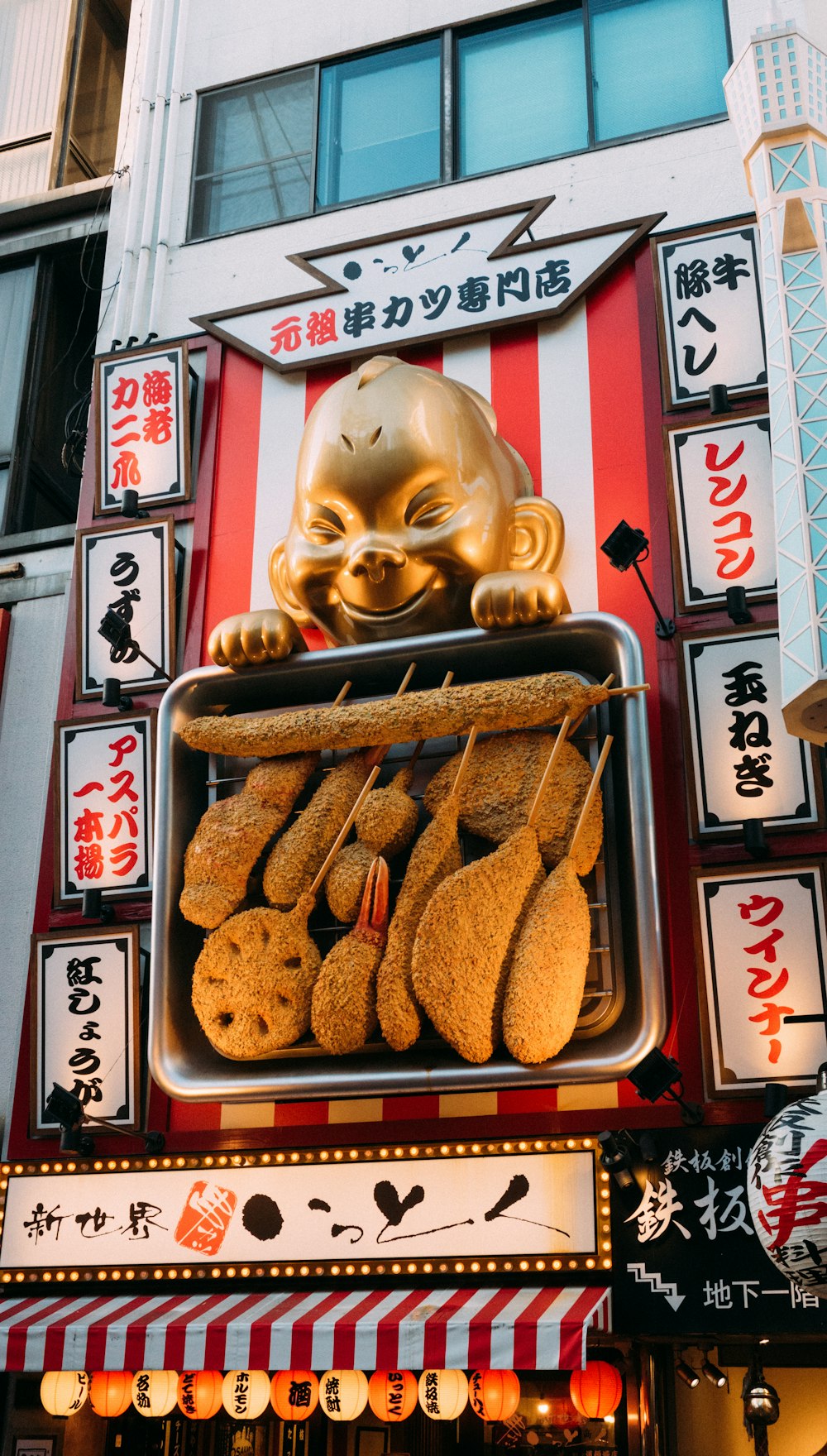 a street sign with a bunch of food on it