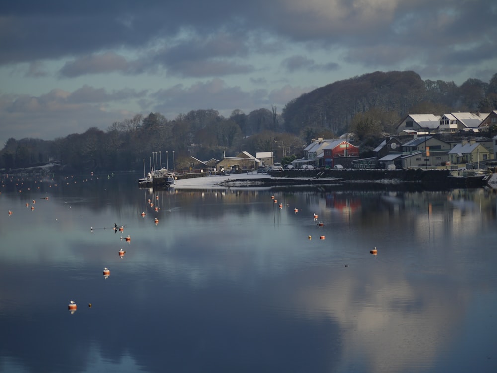 a body of water with houses and boats on it