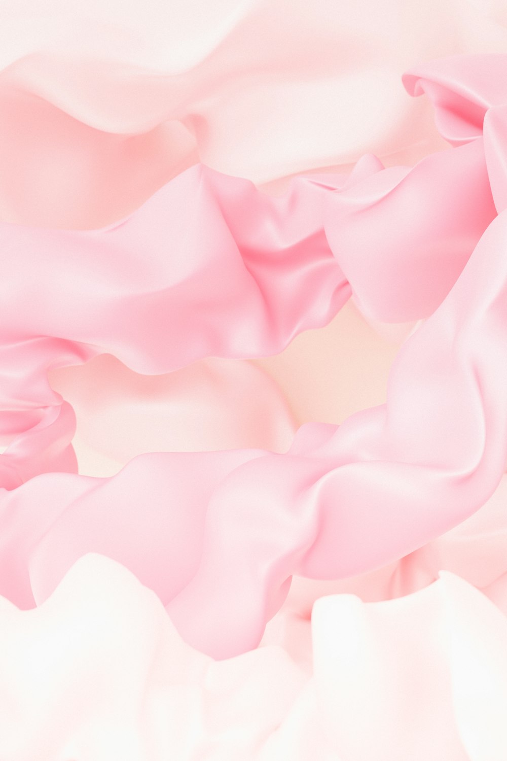 gros plan d’une couverture rose et blanche