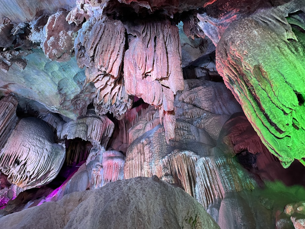 a cave filled with lots of different colored rocks